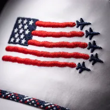Close-up of the embroidered flag flyover